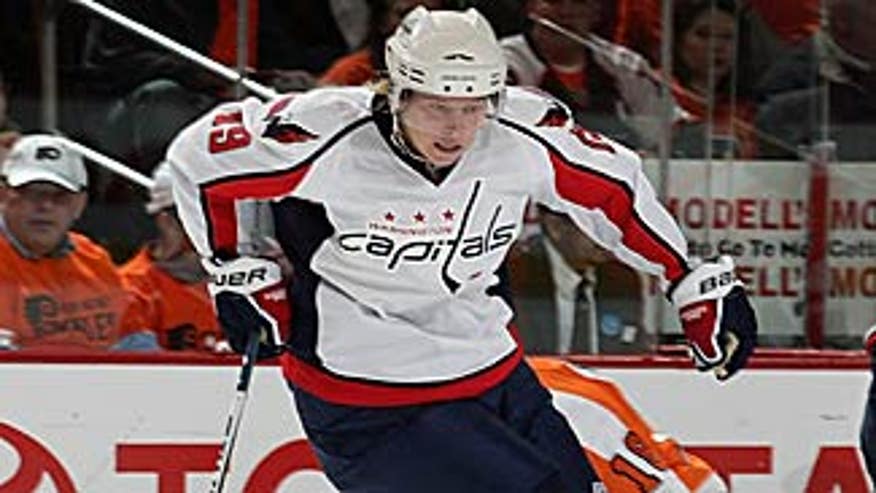 backstrom_nicklas_caps_skates_against_flyers_325x183