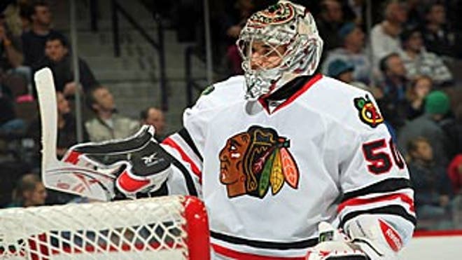 crawford_corey_hawks_looks_on_325x183