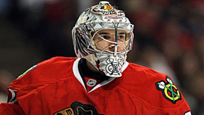 crawford_hawks_looks_on