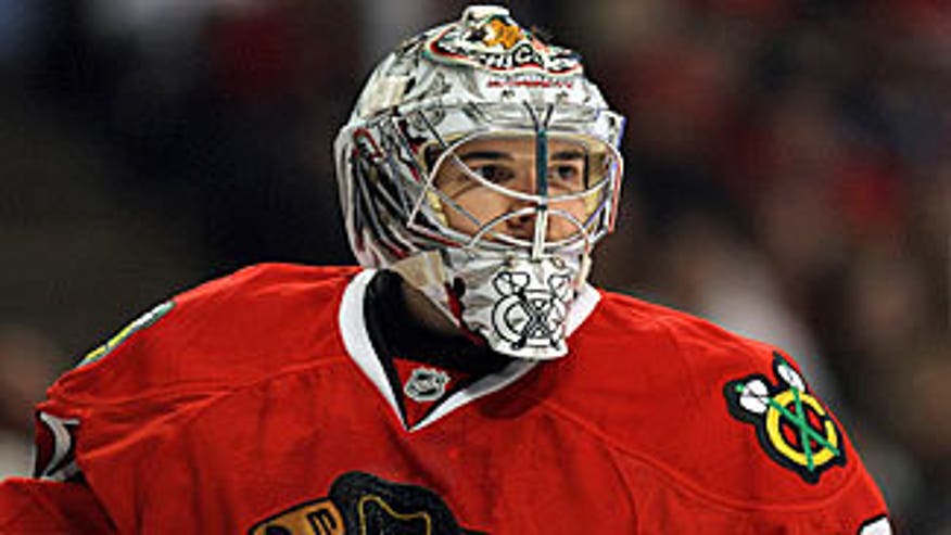 crawford_hawks_looks_on
