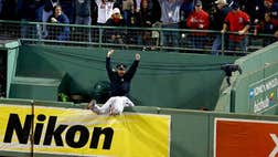 The cop standing in the bullpen as the Red Sox season hung...