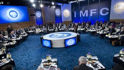 >World finance officials pledged on Saturday to deal with new risks to the global recovery while they kept up pressure on the United States to address the biggest threat of all — a market-rattling default on U.S. debt.