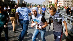 >Egyptian military vehicles fired live rounds at supporters of ousted Egyptian President Mohammed Morsi near Cairo’s Tahrir Square Friday, as thousands of angry protestors marched in cities across the country demanding the end of army-backed rule.