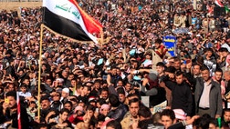 Tens of thousands of Iraqi Sunnis angry over perceived second-class treatment by the Shiite-led government massed along a major western highway and elsewhere in the country Friday for the largest protests yet in a week of demonstrations.