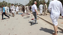 Bombs struck Sunni areas in Baghdad and surrounding areas Friday, killing at least  people in the deadliest day in Iraq in more than eight months, officials said, as a spike in violence has raised fears the country could be on the path to a new round of sectarian bloodshed.