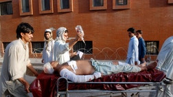 Bombs that exploded outside two mosques in a village in northwestern Pakistan killed at least  people Friday, underlining the challenge of militant violence facing a new government set to take power under the leadership of former Prime Minister Nawaz Sharif.
