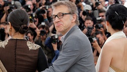 Cristolph Waltz was rushed off the stage as chaos took over a live French television show when two loud bangs rang out in the audience.