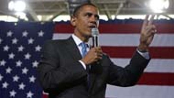 Aug. 11: President Obama addresses an audience in New Hampshire on health care (Reuters).