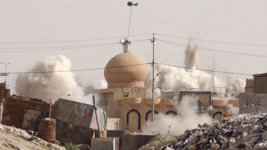ISIS destroys shrines and mosques, may be targeting Mecca ISIS_mosques%20(1)