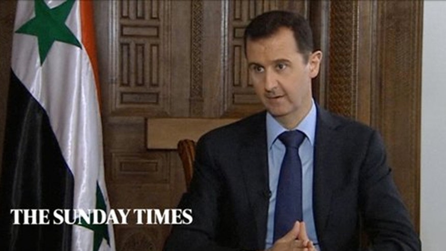 assadnewphoto12.jpg