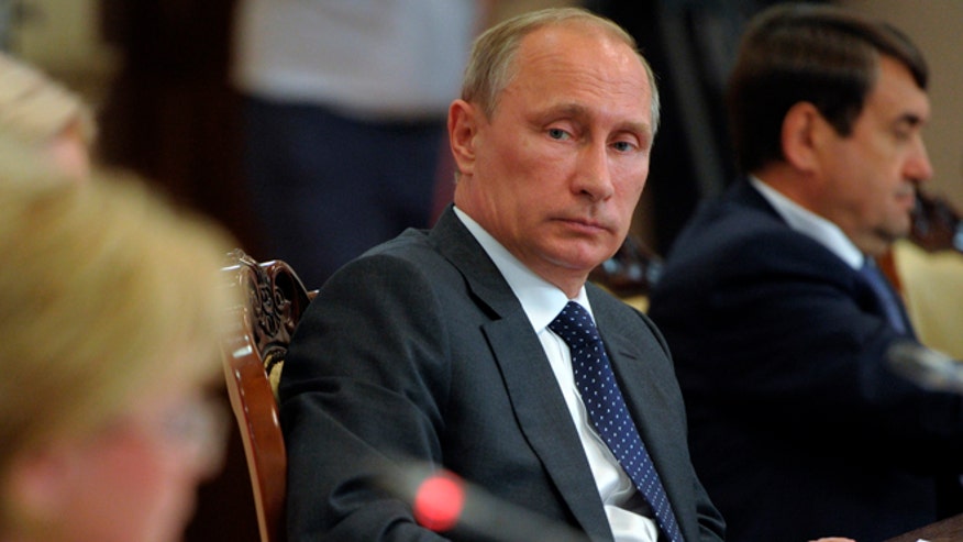 putin-sitting-cropped-internal.jpg?ve=1&