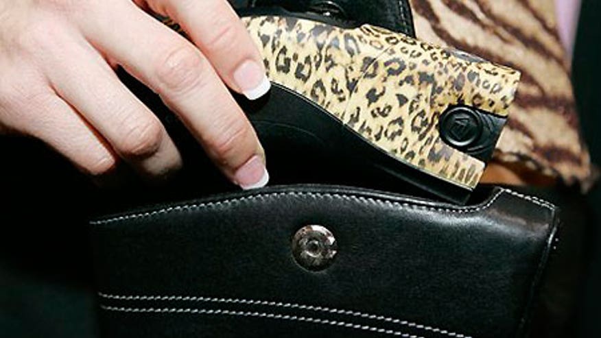 1_21_ces08_taser_leopard.jpg