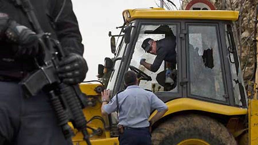 3_21_030509_bulldozer.jpg