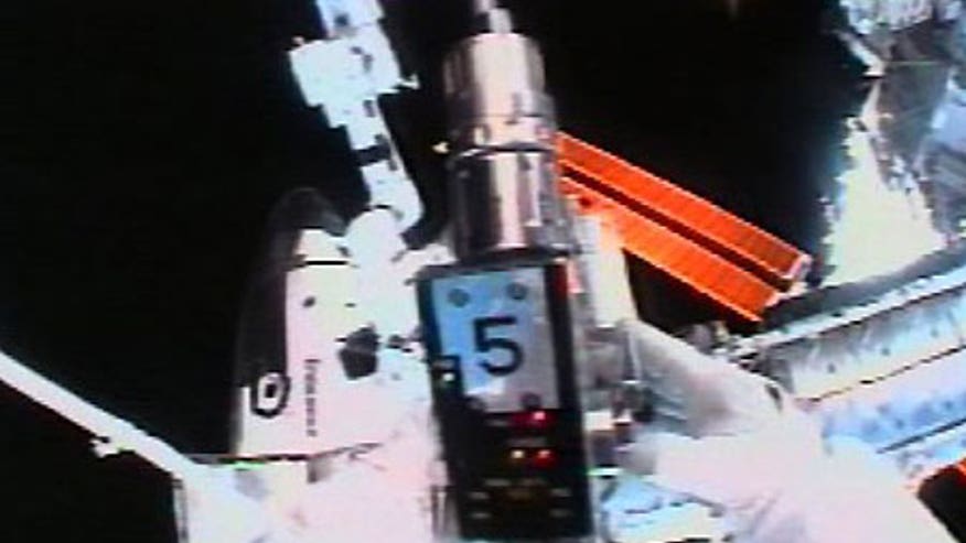 3_28_sts123_eva3_3.jpg