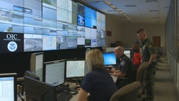 >Computer-edited voices narrate several chase scenes, leaving the viewer with the feeling that they are catching a glimpse of some top-secret security footage they were never meant to see.