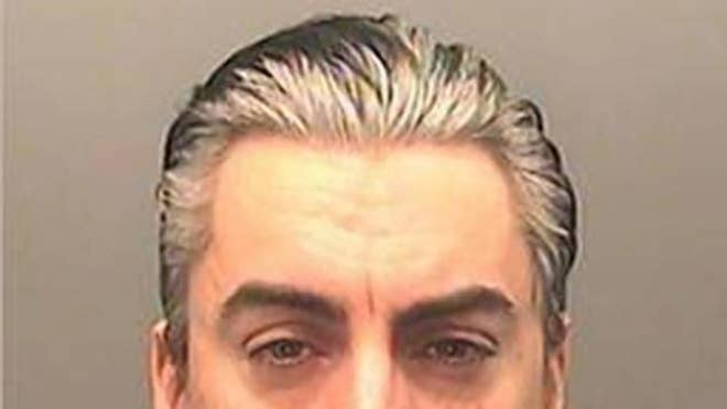 ian watkins mug shot.jpg