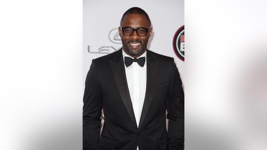 idris elba handsome in tux reuters.jpg