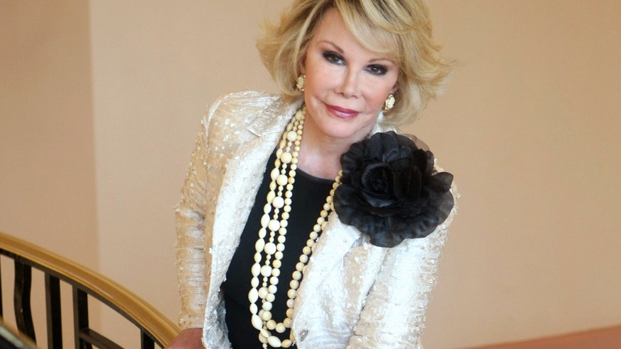 joan rivers big black flower ap.jpg