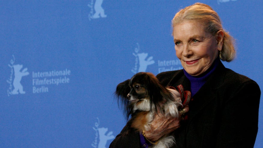 lauren bacall and dog reuters.jpg