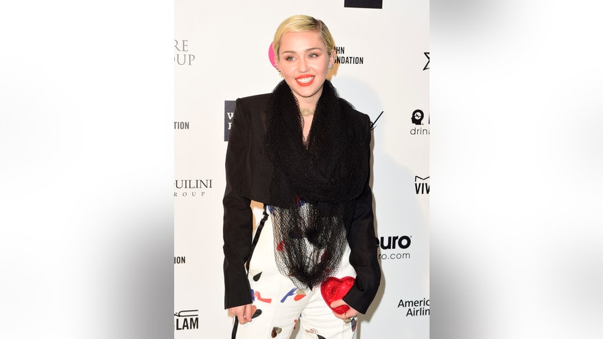 miley heart bag reuters.jpg