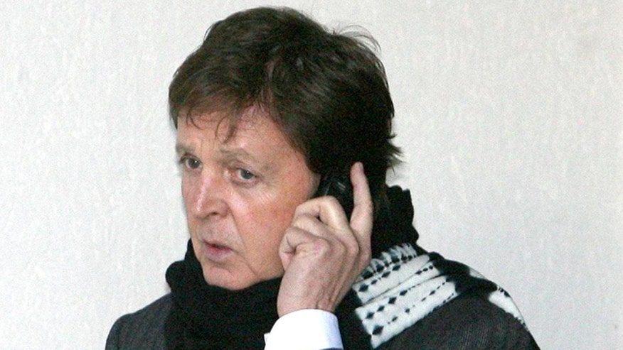paul_mccartney_on_phone.jpg