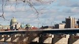 Pennsylvania’s capital city has been struggling with enormous debts and, most recently, an SEC lawsuit. Area business owners say the city’s financial issues have led to an increase in crime that’s hurting sales, yet they remain optimistic about the future.