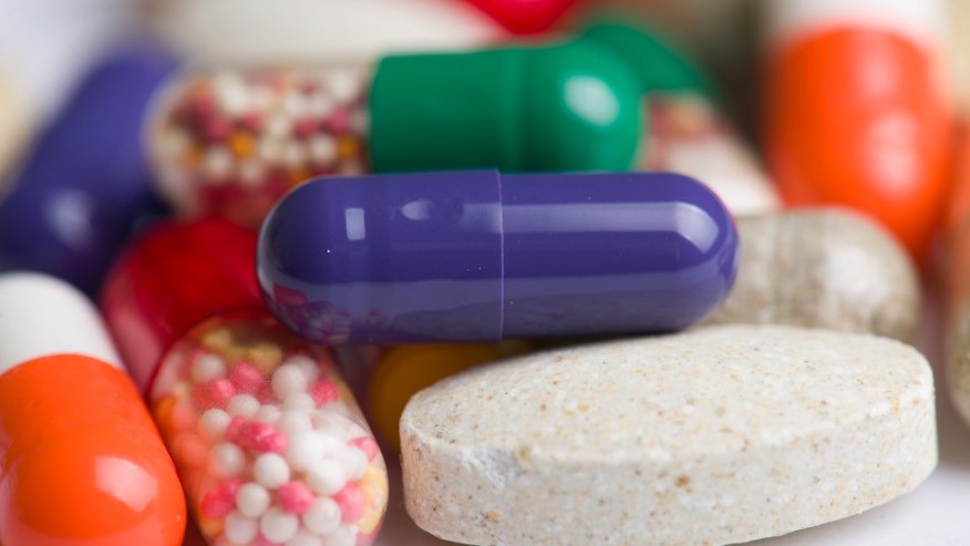 Assorted group of health care prescription drug pills or vitamins