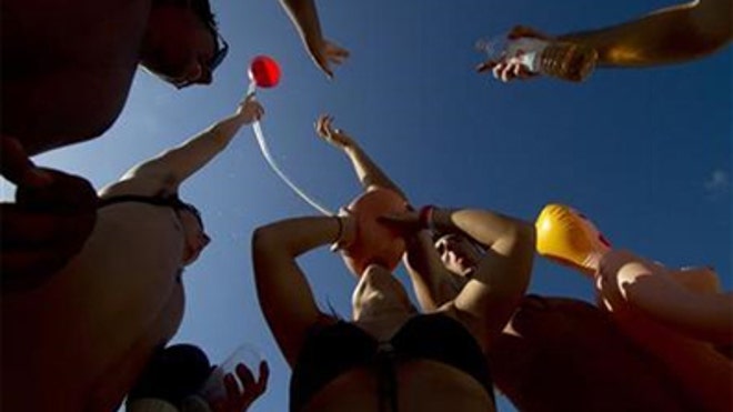 college kids funneling beer