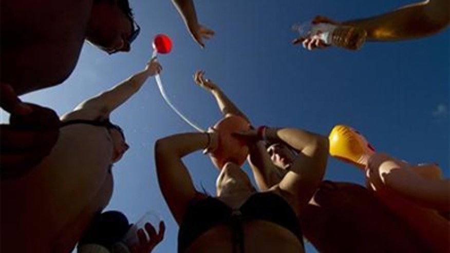 college kids funneling beer