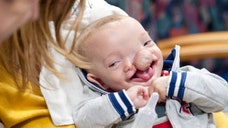 Dominic Gundrum was born with a large triangular gap in his skull, through which part of his brain had seeped - forming a golf-ball sized bubble underneath the skin in his forehead. Given low expectations for survival, Dominic overcame incredible odds, and an extremely complicated surgery has now given him a chance at a full life