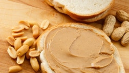 >The eastern New Mexico peanut butter plant shuttered eight months ago after a salmonella outbreak is back in production, and company officials say their coveted natural and organic butters could be back on store shelves within a month.