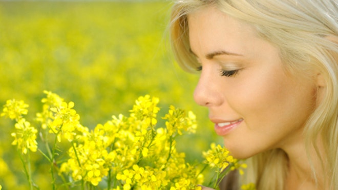 woman_smelling_flowers.jpg