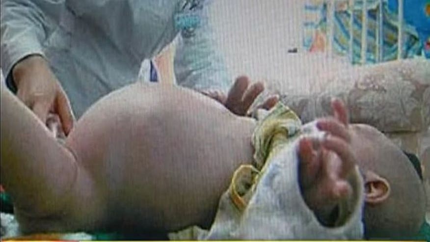 187629-pregnant-china-boy-xiao-feng.jpg