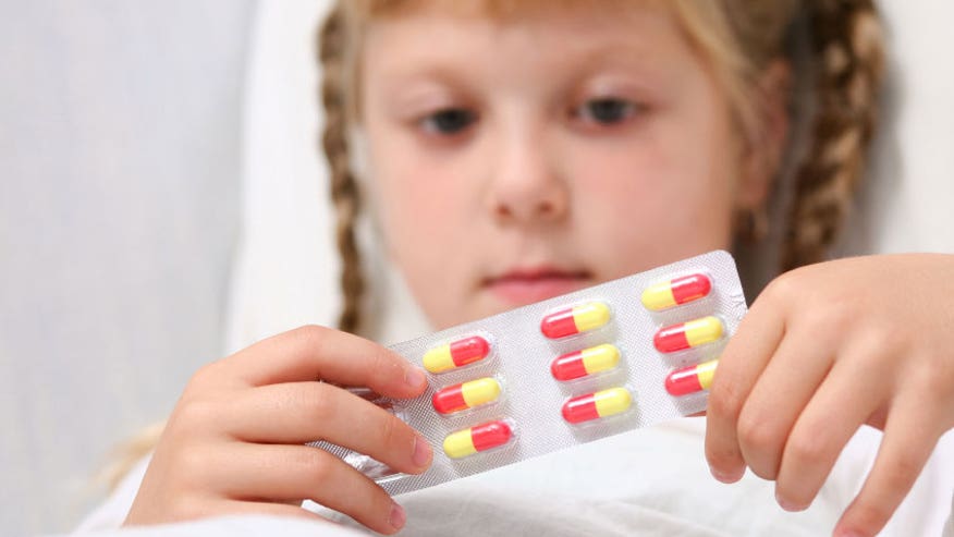 Little-Girl-With-Pills.jpg