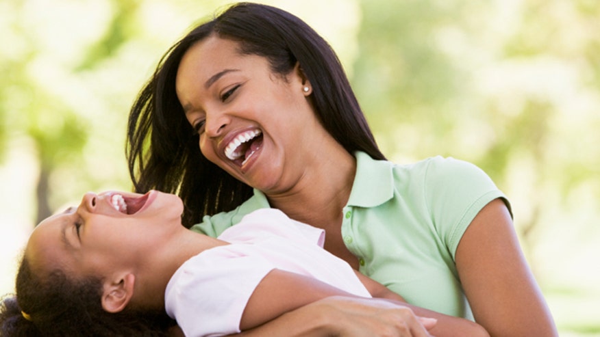 Mom and daughter laughing istock.jpg