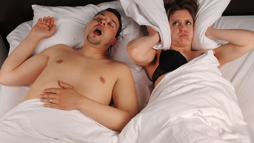 Snoring Couple in Bed