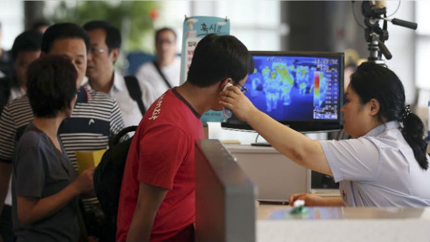 ebola_screening_korea_ap.jpg