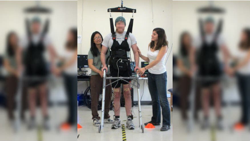 Paralyzed man walks again