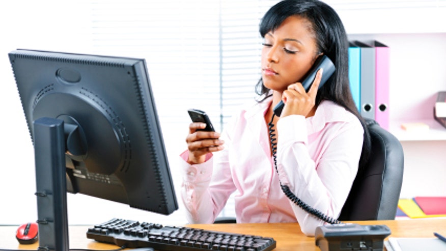woman multitasking in the office