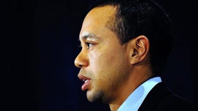 Woods_Tiger_0219stmntAP397.jpg
