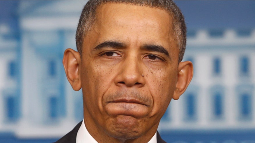 660-Obama-glum-AP.jpg