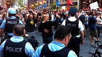 Thousands of protesters marched Sunday outside the NATO summit on Afghanistan, as authorities scrambled to intercept alleged plots against the Chicago gathering and investigate other disruptions.