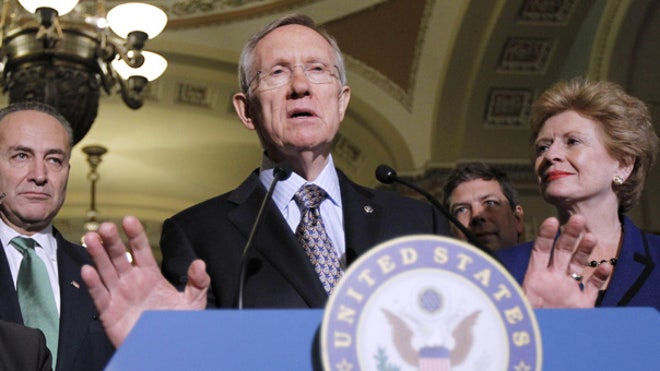 Reid speaks, flanked by Schumer, Murray
