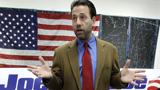 Joe Miller talks to reporters
