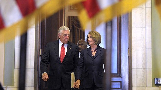 Hoyer, Pelosi walk under flag