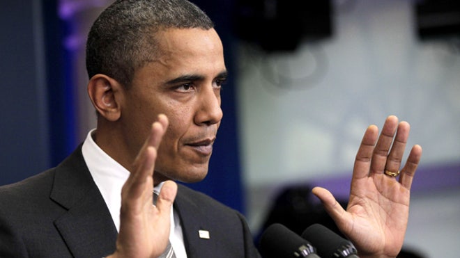 Obama hands up at tax cut news conf