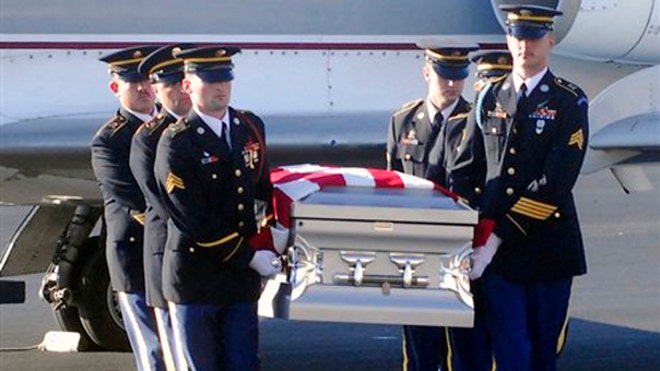 The body of Spc. Fred Greene arrives at Tennessee airport