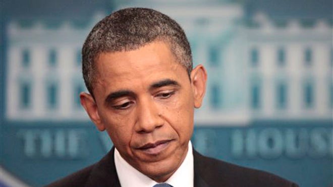obama_briefingrm_071111.jpg