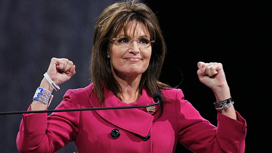 Palin raises arms in Ky.