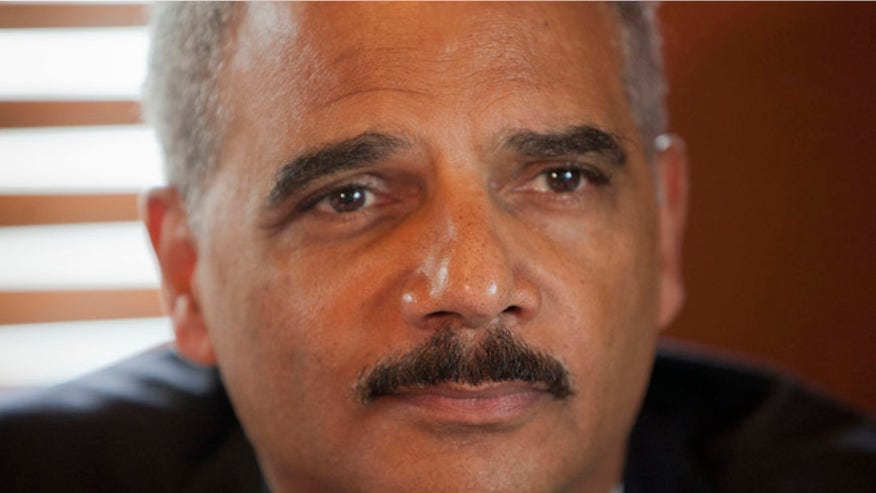Holder_Police shooting_Ferguson_AP_660.jpg